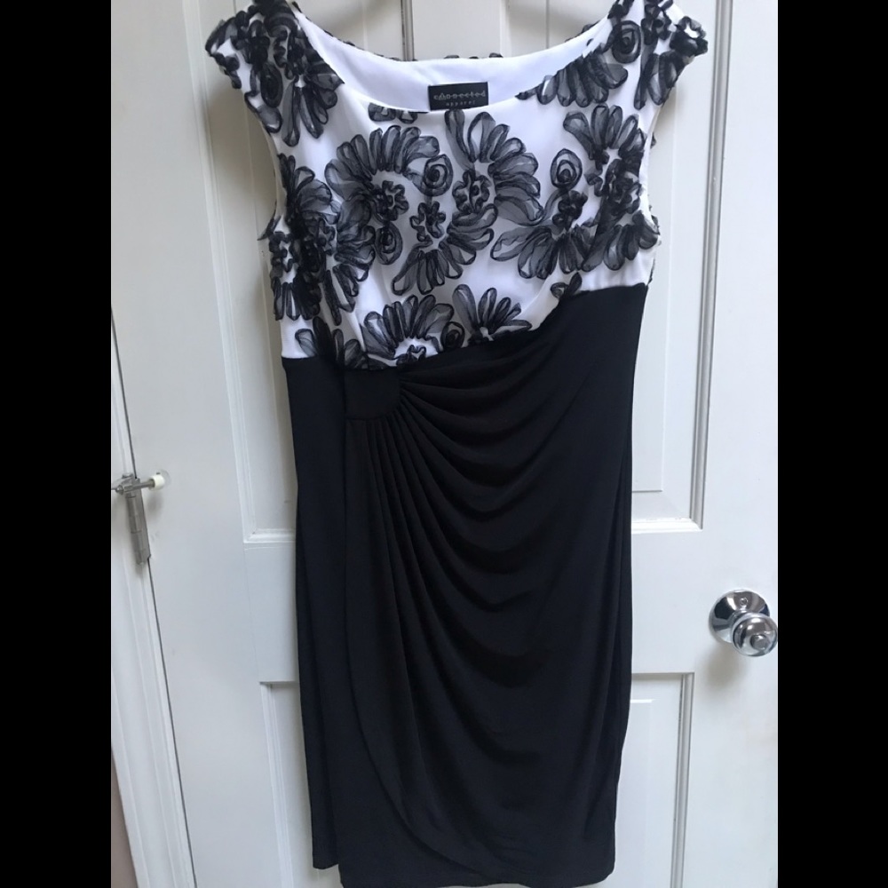 Back & white dress perfect for dressy occasion.